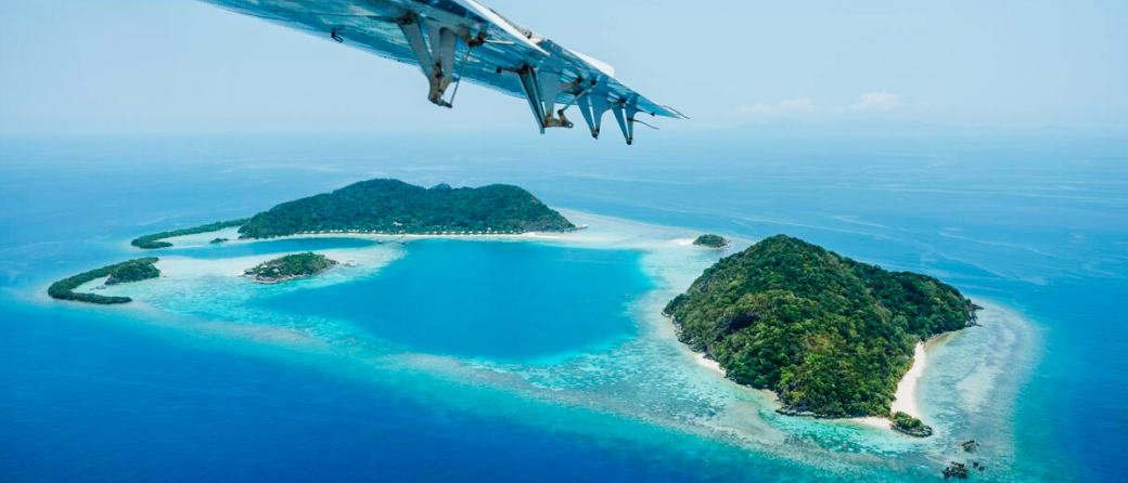 view from airplane of tropical islands