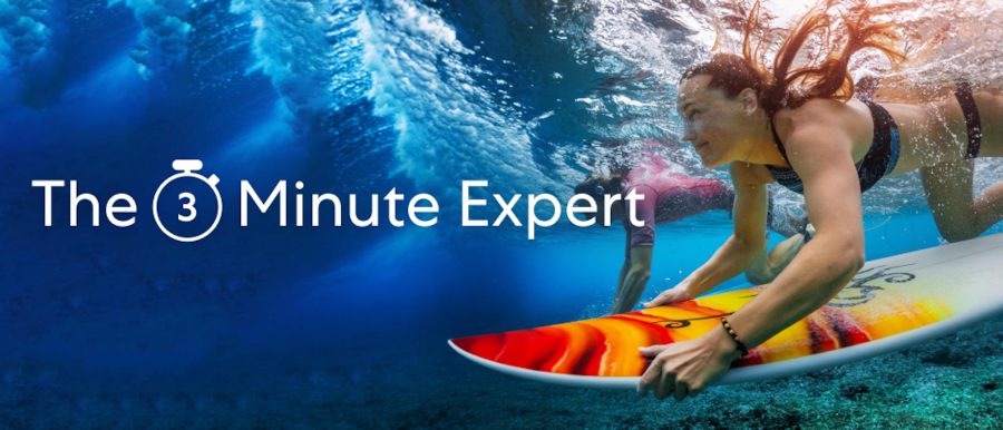Two people swimming underwater with their surfboards. There is text overlay that reads: The three minute expert