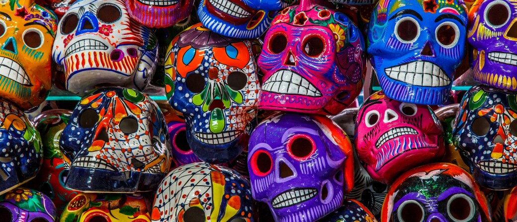 Close-up up shelves filled with Day of the Dead masks in Oaxaca, Mexico