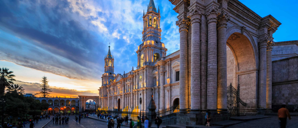 The Plaza de Armas in Arequipa, Peru at dusk. A superimposed title reads: Our 5 favorite.