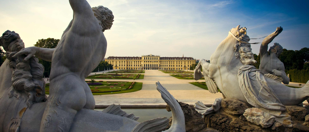 View from behind the statues at Schönbrunner Schloss Park in Vienna, Austria.