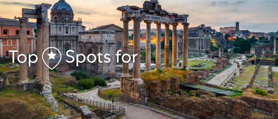 Exterior view of the ancient Roman Forum in Rome, Italy at dusk.