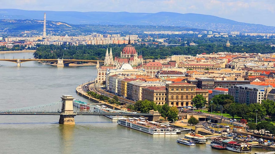 cityscape in Europe with a bridge and water
