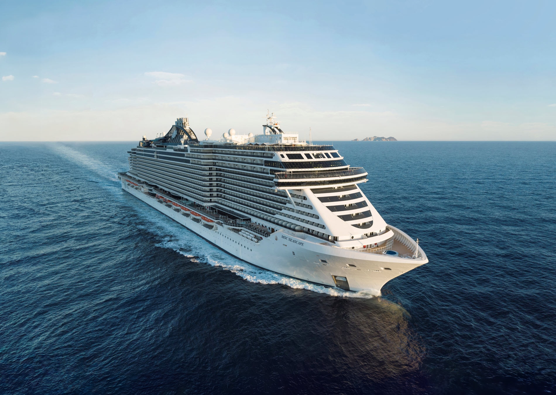 Couple on promenade deck of a cruise ship.