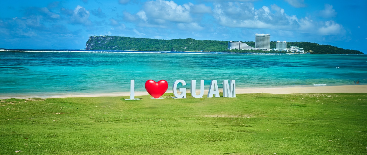 Large white letters with a red heart on the side of it