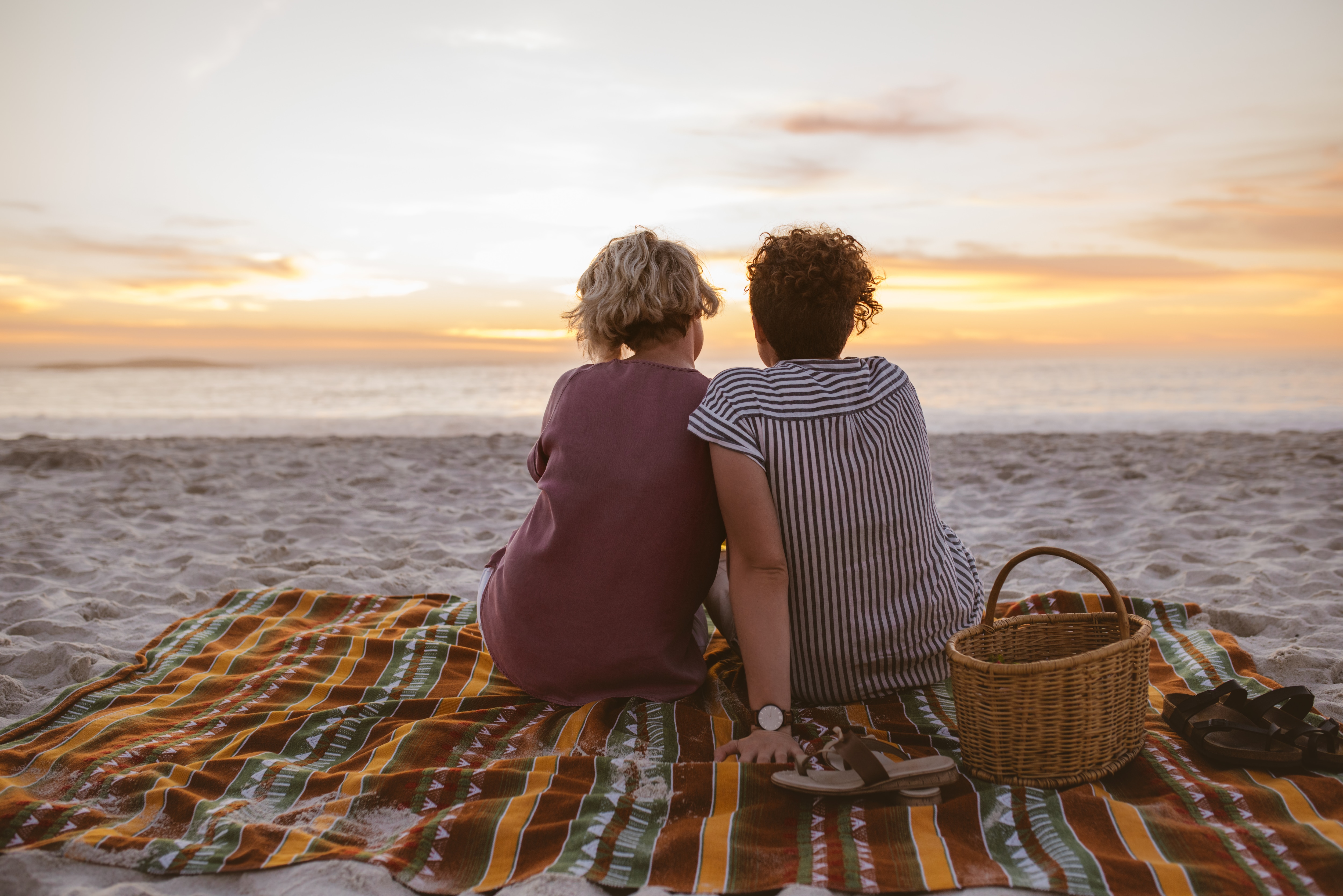 Women sitting on the beach