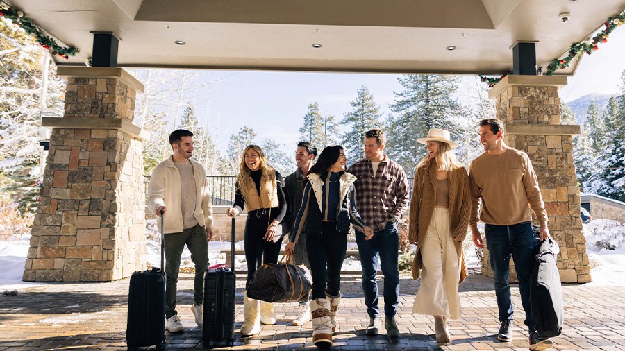 A group of people walking under a canopy