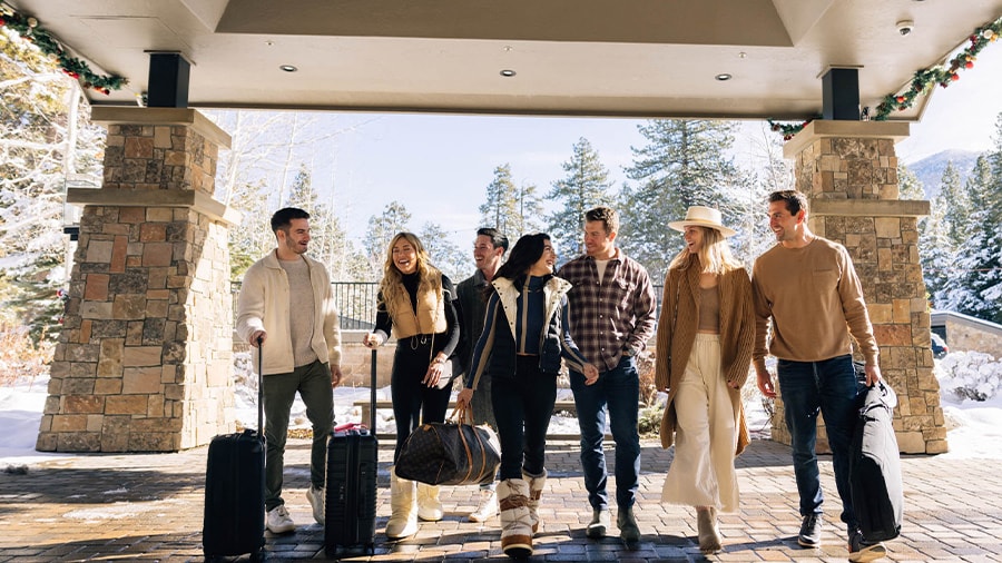 A group of people walking under a canopy