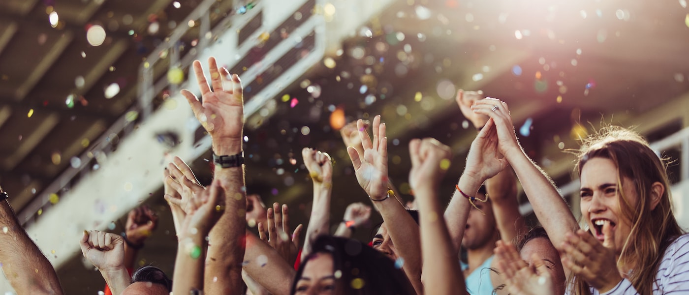Fans cheering in a crowd