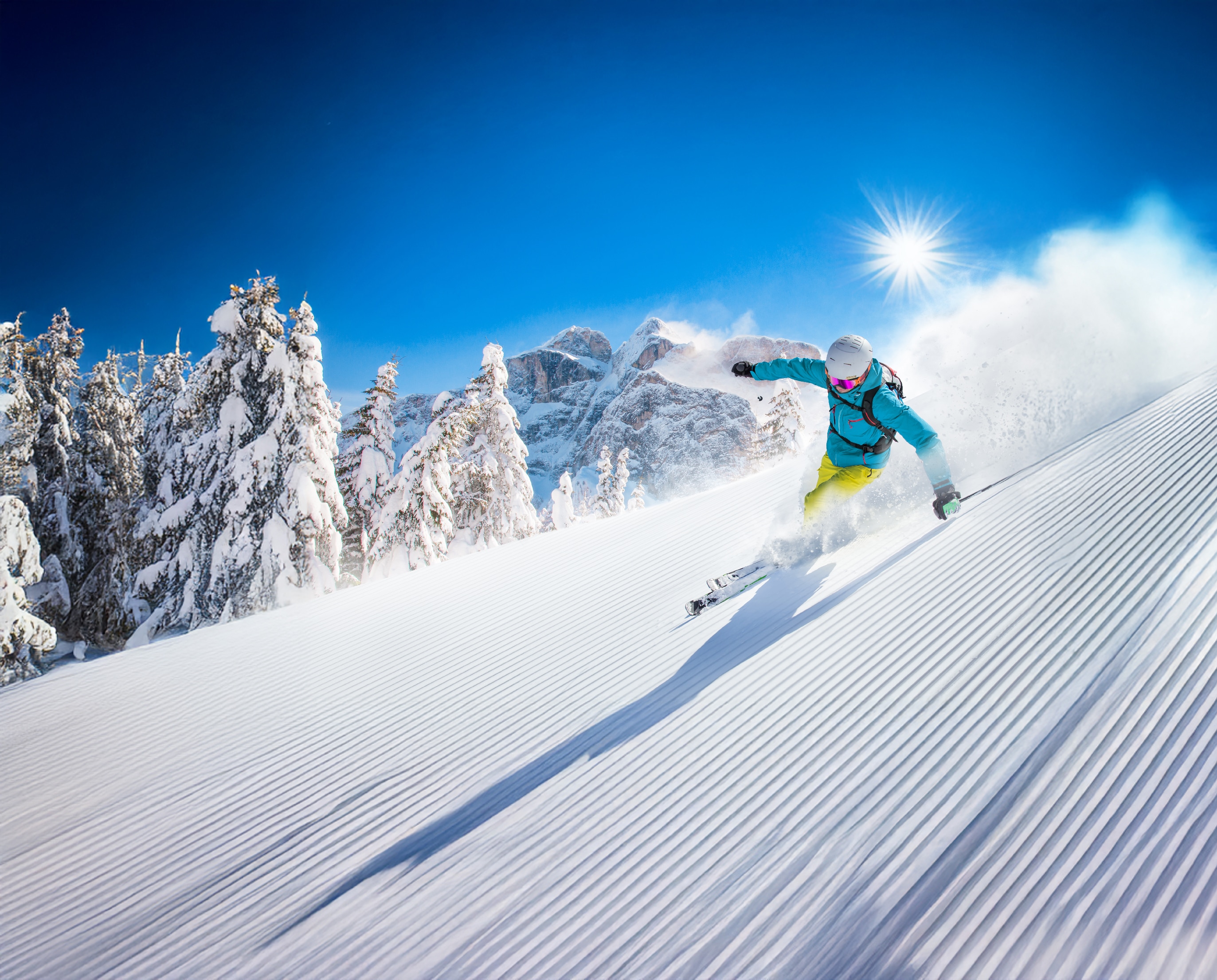 Individual skiing down slope