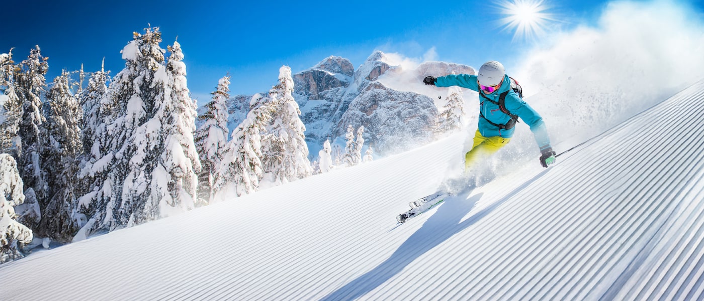 skier going down a mountain