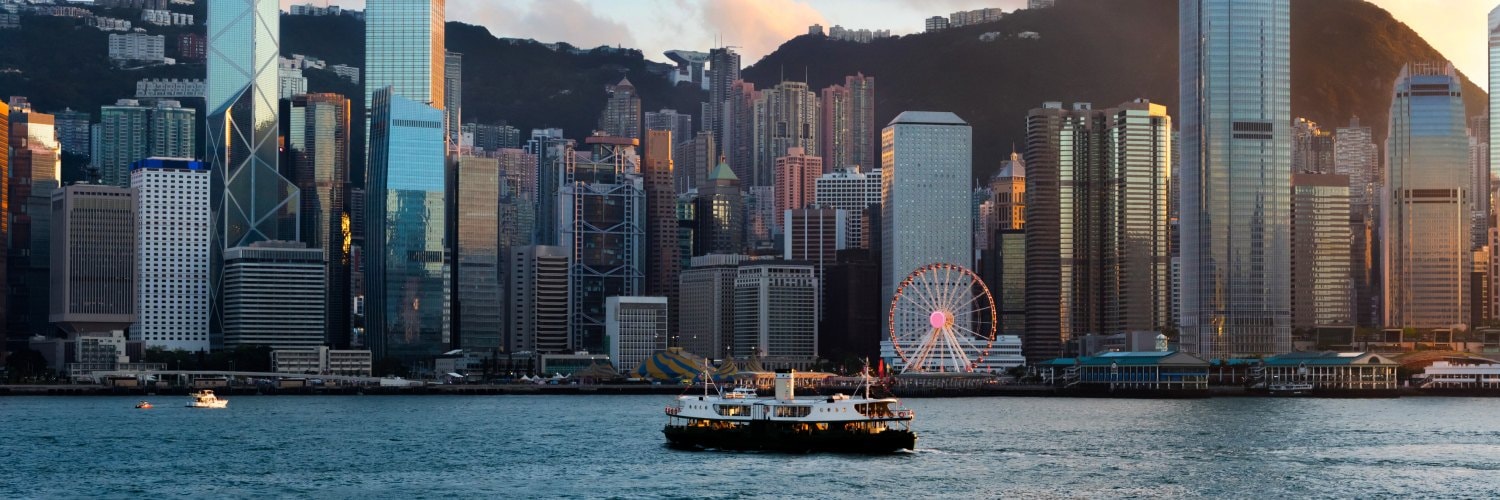 Asian temple behind cherry blossoms