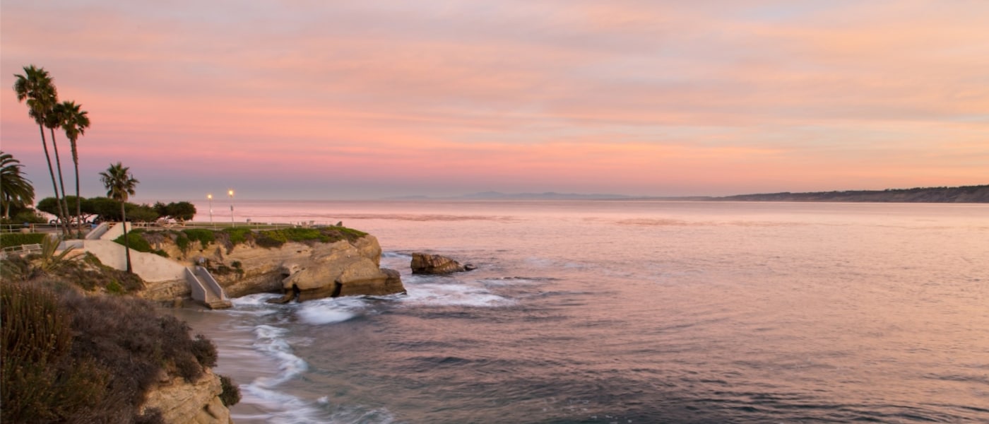 Scenic La Jolla Cover in San Diego, California at sunset.