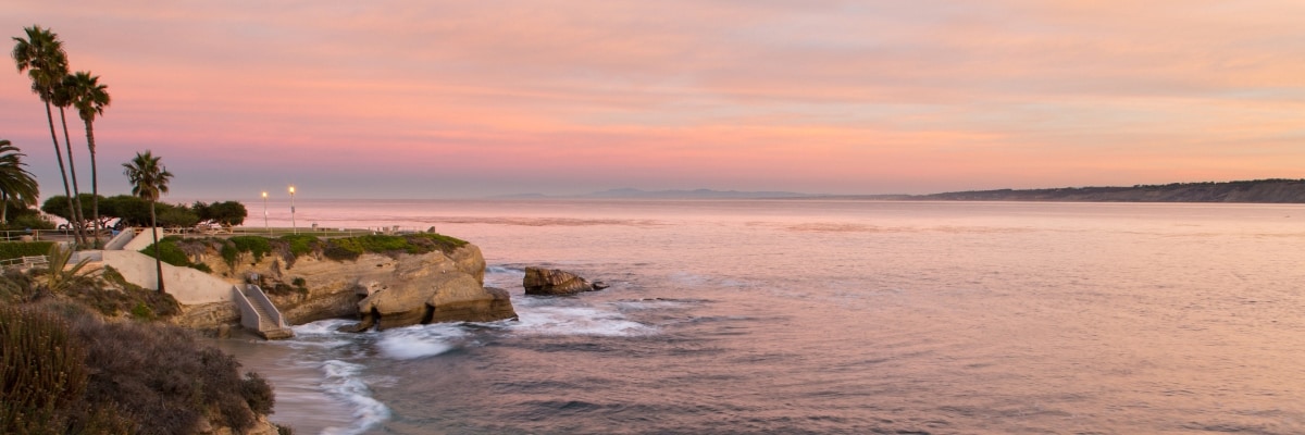 Scenic La Jolla Cover in San Diego, California at sunset.