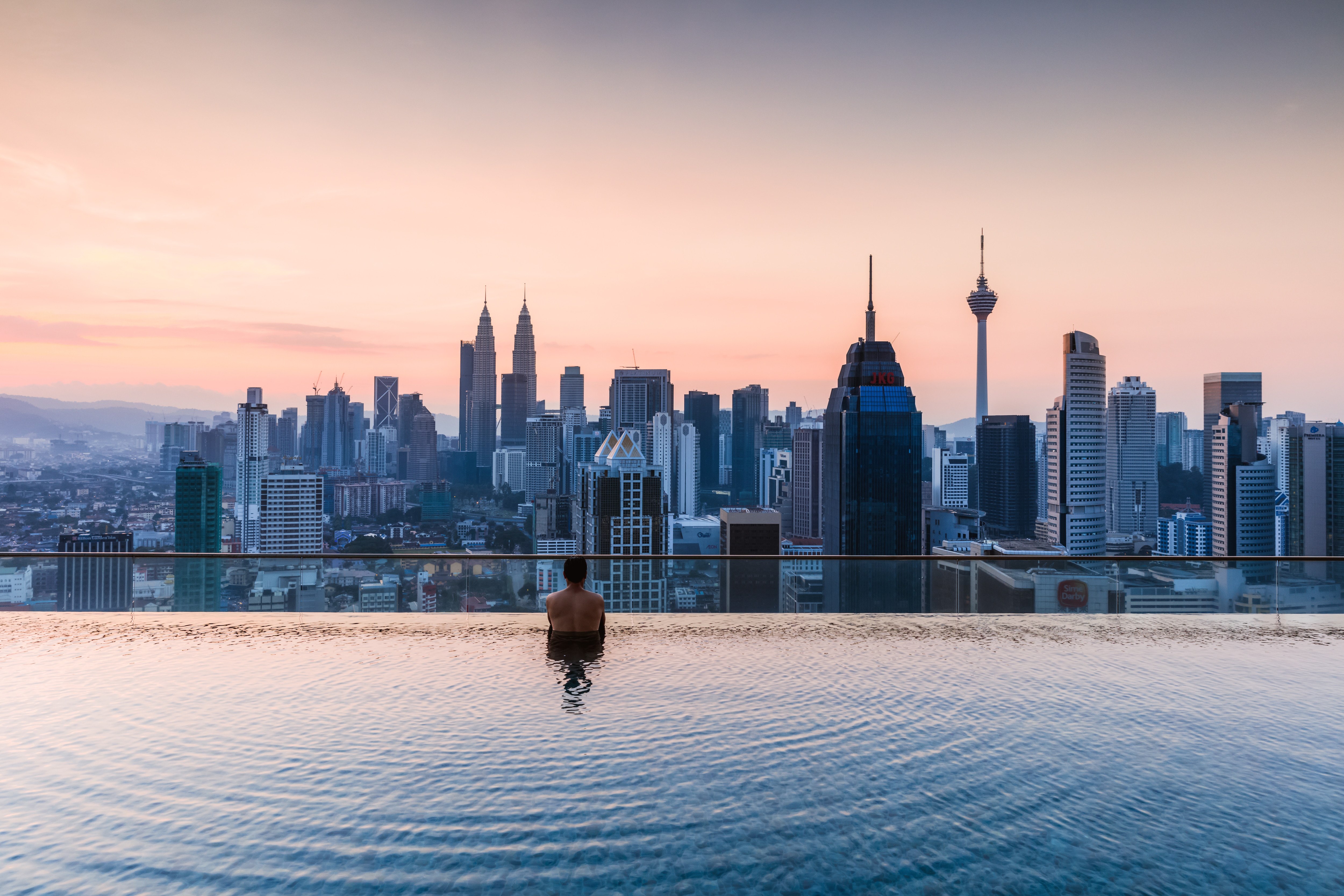 Man in infinity pool