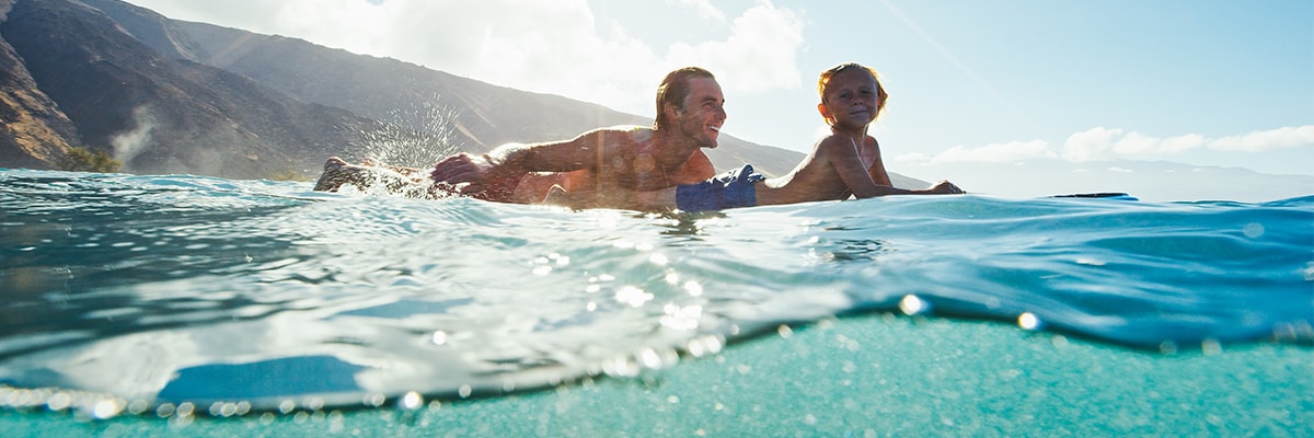 Father and son surfing