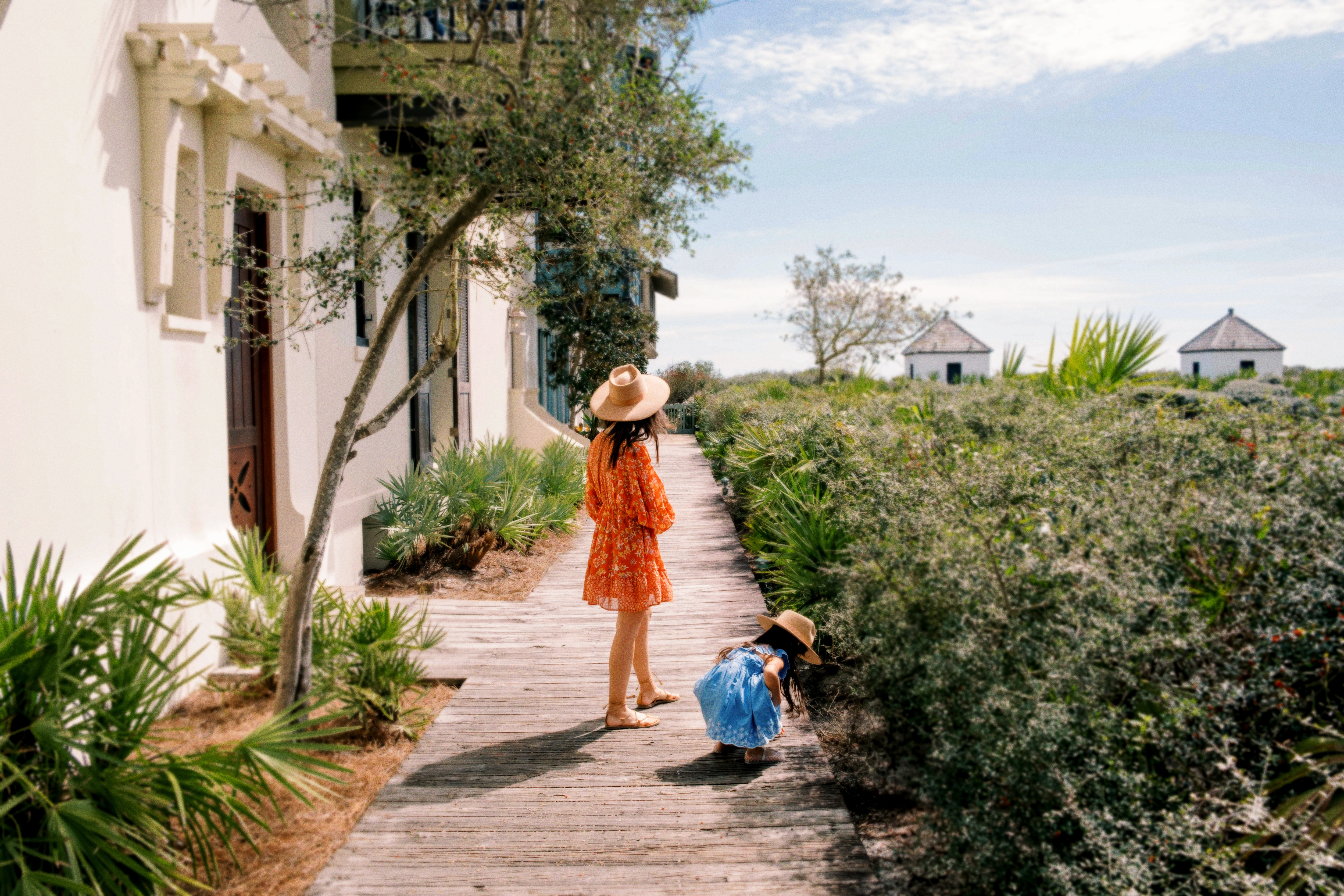 A sunlit vacation home with a spacious deck.